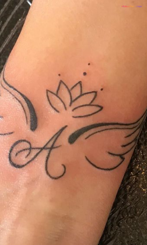 Angel Wing Tattoo With An Initial