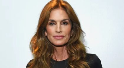 Cindy Crawford’s London Fashion Week Look Included A Versace MBD With Tiny Cutouts