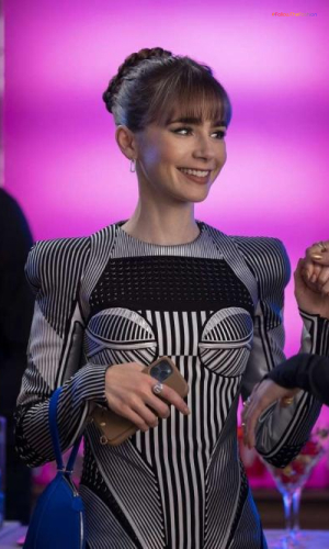 Emily In Black And White Striped Outfit