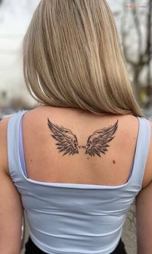 Minimalist Angel Wing Tattoo Separated