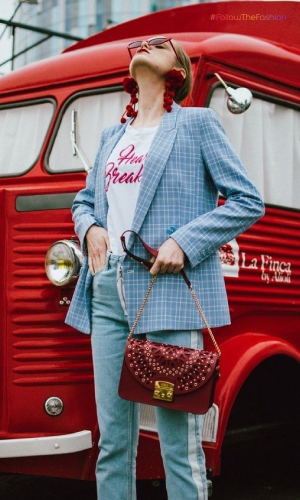 Powder Blue Suit With Red Statement Earrings